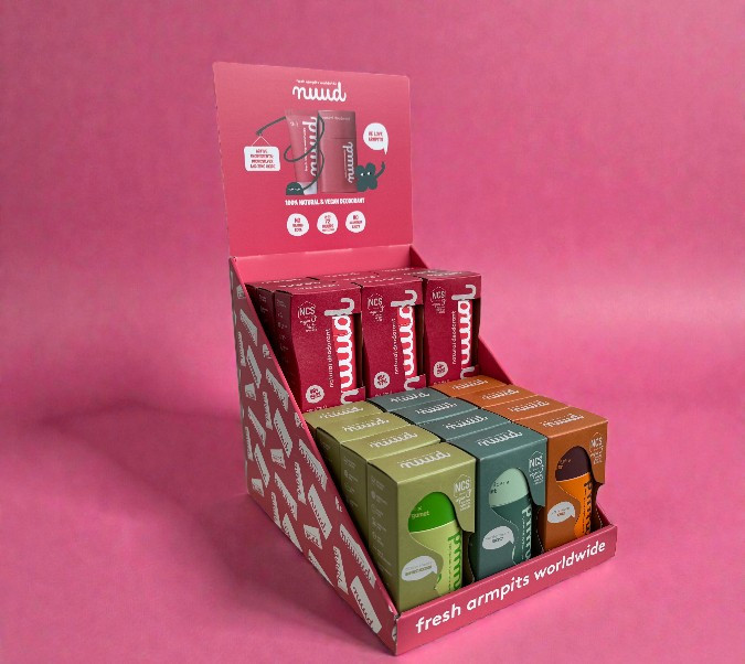 Compacte toonbankdisplay van golfkarton voor de presentatie van deodorant.